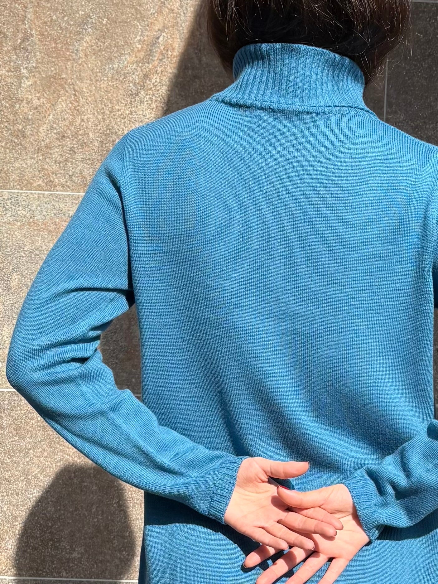 Abito dolcevita treccia