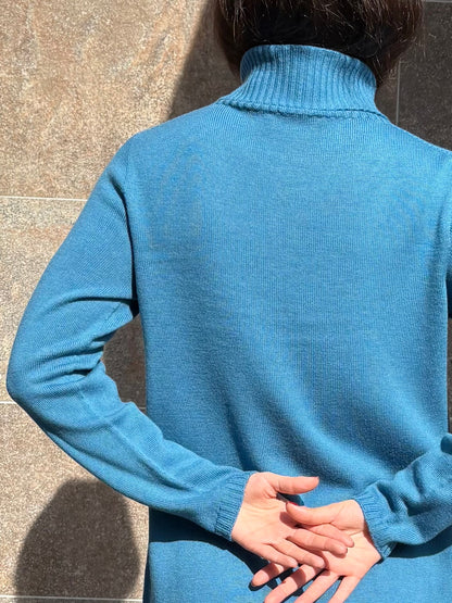 Abito dolcevita treccia